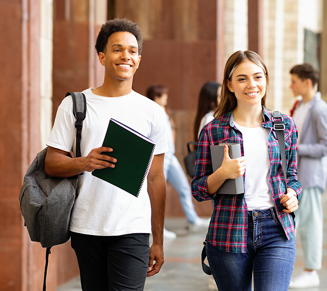Photo of two Students Walking