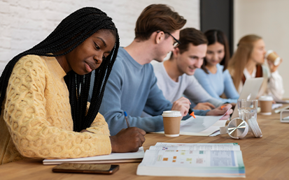 Photo of Students Sitting at a Table