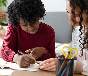 Photo of Two Students Having a Conversation